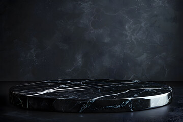 Black marble pedestal on a dark textured background. Elegant display for product showcasing and luxury design concepts