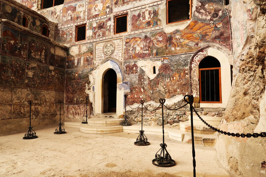 The front facade of the Rock Church at the Sumela, Sümela Monastery, completely covered in colorful frescos, Trabzon, Turkey