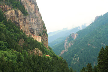 Spectacular view onto the Sumela, Sümela Monastery, built on a cliff above a dense forest next to a gorge, Trabzon, Turkey