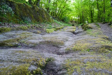 ancient street and path driven in the rock by wheels of many transportation trucks