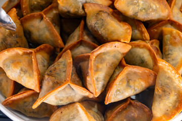 Lebanese Spinach Pies traditional Fatayer fried in oil
