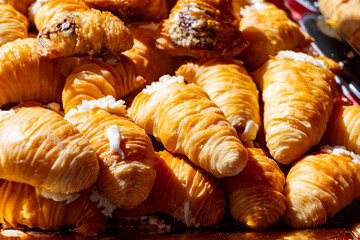 Naples sfogliatella, shell-shaped layered pastry, with sweet custard-like filling made with...