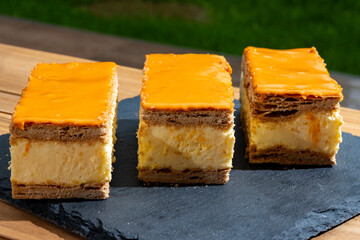 Celebration of the King birthday in Netherlands, tompoes or tompouce, iconic pastry in Netherlands...