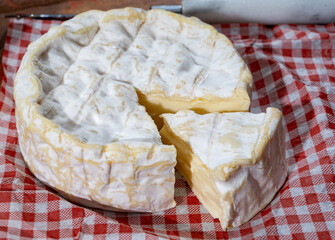 French soft Camembert cheese, original Camembert de Normandie, with white mold