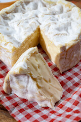 French soft Camembert cheese, original Camembert de Normandie, with white mold