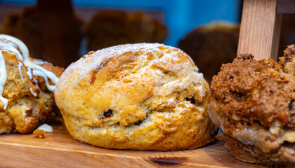 Scones - traditional British baked good, popular in the United Kingdom and Ireland, tea buns make with yeast with different toppings