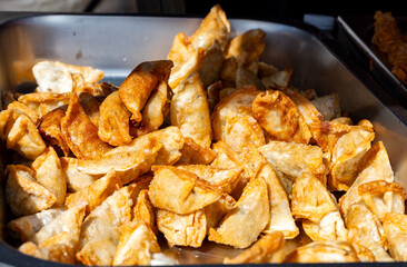 Asian food, fried in oil filled vegetarian dumplings