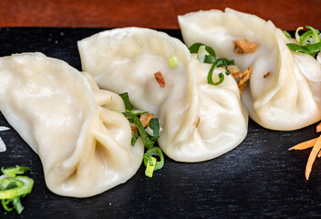Asian food, steamed cooked filled gyoza dumplings