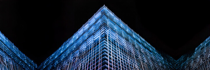 w building facade architecture structure by night isolated on a black background