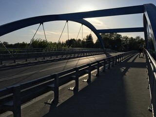 Modern metal bridge for cars and cyclists