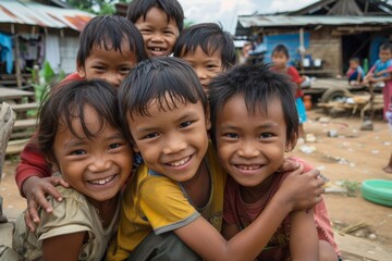 Portrait of a group of children smiling in the village in Cambodia