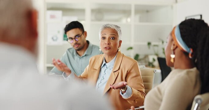 Senior, woman or business people in meeting with talking in teamwork for creative decision making. Collaboration, manager or professional employees with paperwork for project brainstorming in office