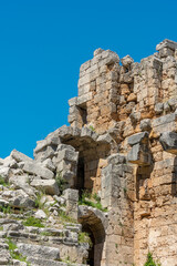 Picturesque ruins of an amphitheater in the ancient city of Perge, Turkey. Perge open-air museum.