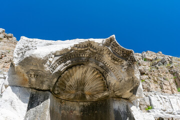 Picturesque ruins of an amphitheater in the ancient city of Perge, Turkey. Perge open-air museum.