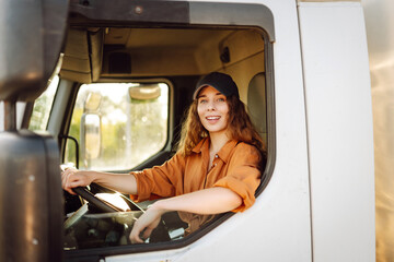 Truck driver woman, trucker occupation in Europe for females. People and industrial transportation...