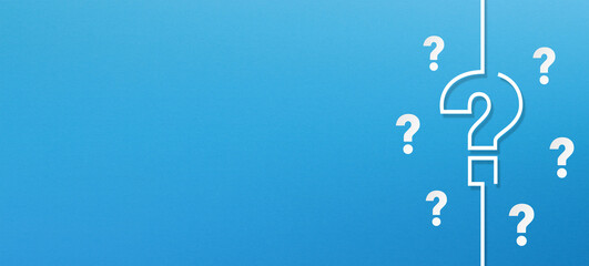 Question mark design with copy space on blue background	