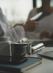 Charming female doctor giving advice to a female patient.