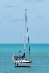 Fototapeta premium Solar and Wind Powered Sailboat Near the Shore of Marathon, Florida