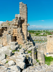 Picturesque ruins of an amphitheater in the ancient city of Perge, Turkey. Perge open-air museum.