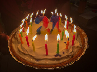 Twenty-first birthday pie with lit candles