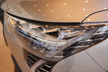 Close up of cars headlight showcasing automotive exterior design