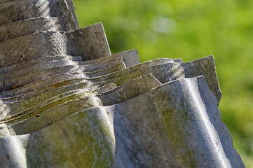 Stack of asbestos roofing sheets. Carcinogenic eternite.