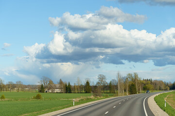Infinite Road Under Cloudy Skies