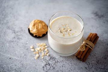 Peanut butter banana smoothie in a glass
