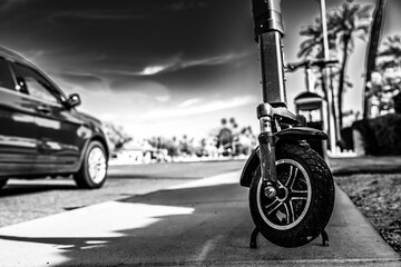 Selective focus on front wheel of a rental electric scooter in Phoenix, Arizona 