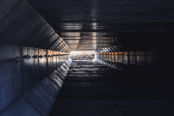 Dark Tunnel With Light at the End