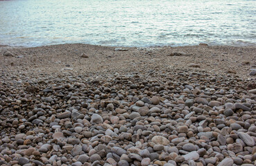 small, round rocks in the beach of Silence
