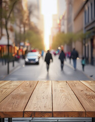 The empty wooden table top with blur background of street in downtown business district with people walking.