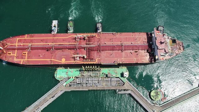 Aerial view of cargo ship on Water Terminal Madre de Deus, intended for receiving oil and shipping petroleum derivatives processed by the Mataripe Refinery. - Madre de Deus, Bahia, Brazil 