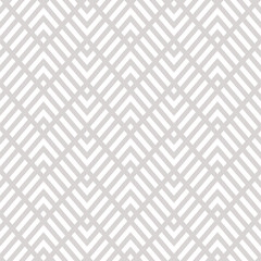 Geometric line seamless pattern. Vector chevron texture. Subtle gray and white zigzag stripes, grid, lattice, mesh, diagonal lines. Abstract minimal zig zag background. Simple geometry. Repeat design