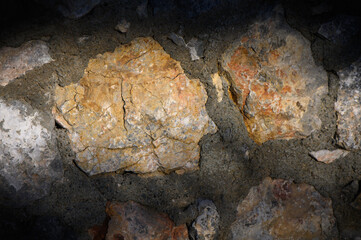 grey stone dark wall of medieval horizontal stones facade background 1