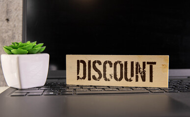 text discount on a wooden background