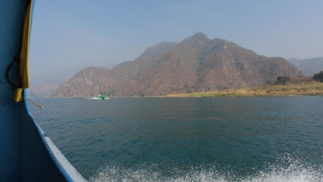Boat ride on lake atitlan in Guatemala in slow motion 