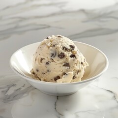 a scoop of creamy edible cookie dough with chocolate chips