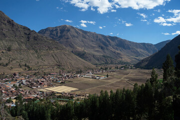 Landscape composed of mountains surrounding the sacred valley under a sky with clouds