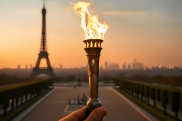 closeup back view of an athlete holding in hand a tall olympic games fire torch in front of eiffel tower - obrazy, fototapety, plakaty