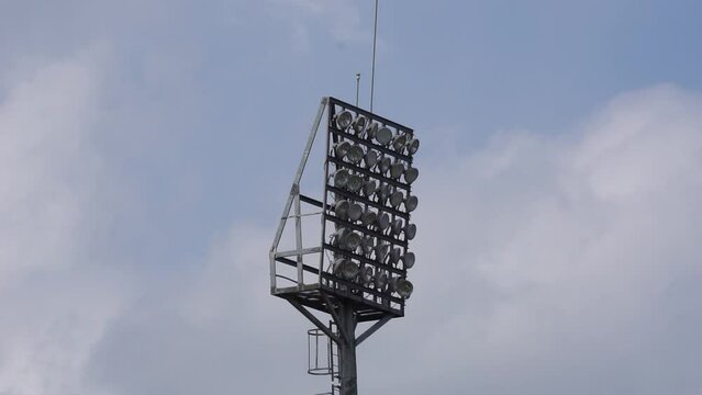 Stadium lights with dramatic sky background. This image is suitable for a variety of projects