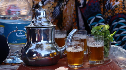 Moroccan Mint Tea with Traditional Teapot and Glasses