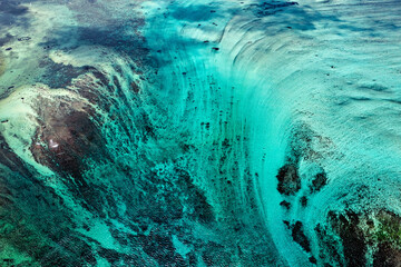 Aerial view of Underwater Waterfall in Mauritius, beautiful blue lagoon and underwater waterfall....