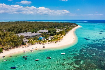 Tropical scenery, beautiful beaches of Mauritius island, Le Morne, popular luxury resort. Le Morne beach luxury resorts, Mauritius. Luxury beach in Mauritius, sandy beach with palms and blue ocean.