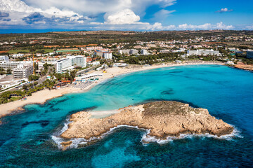 Aerial view of beautiful Nissi beach in Ayia Napa, Cyprus. Nissi beach in Ayia Napa famous tourist beach in Cyprus. A view of a azzure water and Nissi beach in Aiya Napa, Cyprus.
