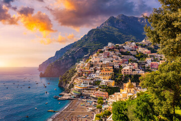 View of Positano with comfortable beach and blue sea on Amalfi Coast in Campania, Italy. Positano...