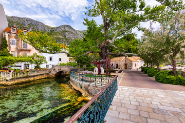 Naklejka premium Idyllic village of Mlini in Dubrovnik archipelago view, south Dalmatia region of Croatia. Adriatic village of Mlini waterfront aerial view, Dubrovnik coastline of Croatia.