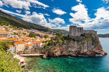 Naklejka premium Dubrovnik a city in southern Croatia fronting the Adriatic Sea, Europe. Old city center of famous town Dubrovnik, Croatia. Picturesque view on Dubrovnik old town (medieval Ragusa) and Dalmatian Coast.