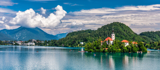 Lake Bled in Slovenia. Beautiful mountains and Bled lake with small Pilgrimage Church. Bled lake and island with Pilgrimage Church of the Assumption of Maria. Bled, Slovenia, Europe.