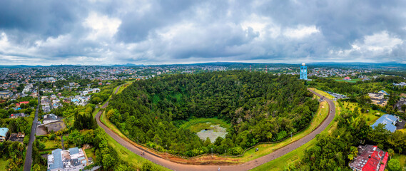 Aerial top view perspective of Trou Aux Cerf Volcano Curepipe in the tropical island jungle of Mauritius. Aerial view of Trou aux cerfs dormant volcano located at Curepipre, Mauritius